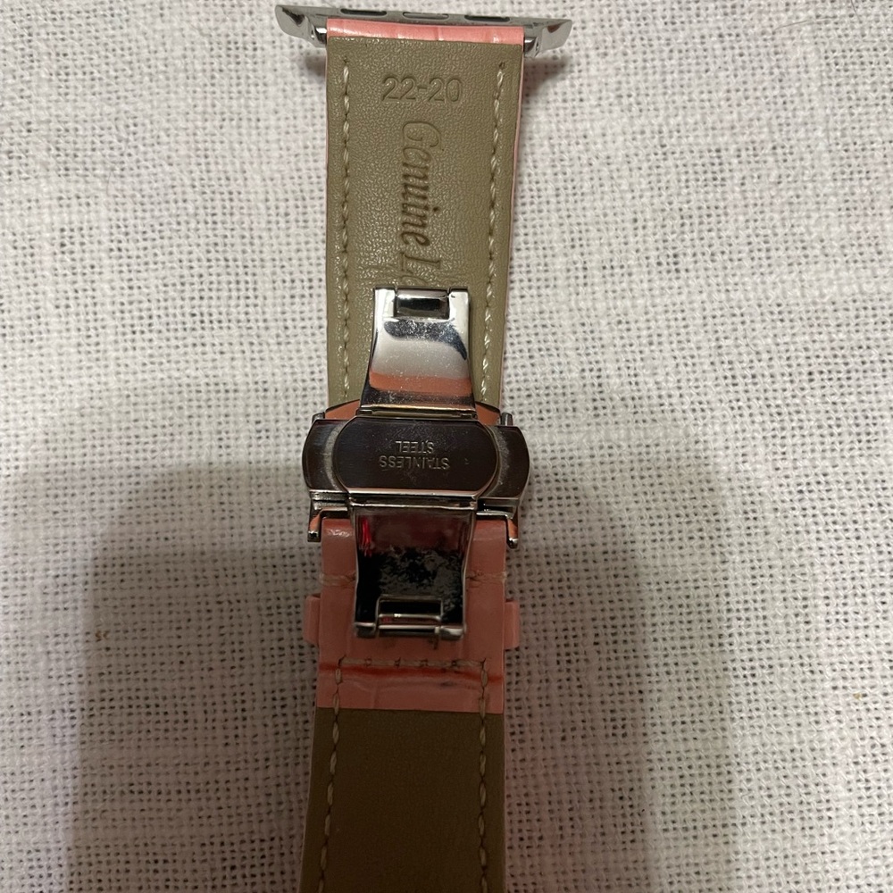 2 watch bands.. one camo color/silicone and One leather with adjustable buckle